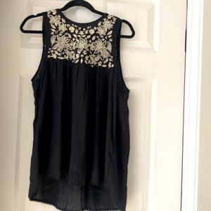 Black silk like fabric tunic.